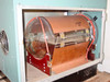 LFE PFS/PCrE/PDS-501 — front door open showing copper-shielded barrel reactor chamber with red O-ring door seal and perforated metal sample tray inside