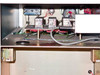 LFE PFS/PCrE/PDS-501 — interior base compartment open showing three relay modules, wiring harness, and lower electrical components