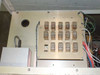 LFE PFS/PCrE/PDS-501 — interior upper compartment panel showing array of approximately 15 relay modules mounted on aluminum plate with wiring, and a small gray component box