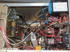 LFE PFS/PCrE/PDS-501 — interior electronics compartment showing dense wiring, multiple circuit boards, transformers, solenoid components, and a blue switching power supply module