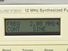 Wavetek Model 23 LCD display close-up showing FREQ 2.08 MHz and CONT SINE readout