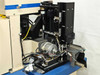 K&S 1484 wire bonder bonding head assembly closeup showing servo motor, actuators, and bond arm mechanism