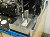 K&S 1484 work stage closeup showing aluminum work holder fixture and bond head positioned above