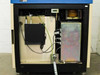Left side interior cabinet view showing power transformer, black sub-assembly module, and iridescent metal panel with wiring