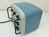 Singer 91263-1 Impulse Field Generator – right-side view showing blue and gray enclosure, carrying handle, and rear of front panel controls