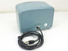 Singer 91263-1 Impulse Field Generator – rear view showing blue painted steel enclosure with AC power cord entry, warning label, and calibration sticker