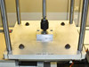 BF-200 tape cut head detail – aluminum platen labeled 'TAPE CUT HEAD' with central cutting tool and four corner locating pins