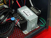 Hitran AT0098-01 interior — secondary control transformer (appears to be GE or similar branded) with terminal block connections