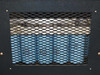 Hitran AT0098-01 — ventilated side mesh panel view showing internal coil/transformer components visible through expanded metal grille