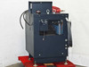 Hitran AT0098-01 welding power supply transformer — front/right side view showing enclosed steel cabinet on pallet with red coolant hose on top
