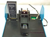 Dynatech Minireader II top-open view showing microplate reading stage, optical pathway, and Advanced Applications Module installed
