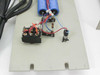Internal boards with 6300µF 100VDC electrolytic capacitors and wiring harness visible