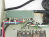 Close-up of circuit breaker handles and trip mechanisms