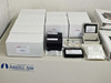 Thermo Jarrell Ash accessories spread showing boxed torches, spray chambers, nebulizer, software CD and manuals