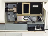 Interior view of IRIS Advantage spectrometer showing optical bench, flow meter, pressure gauge and sample introduction components