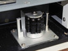 Close-up of peristaltic pump roller head assembly on IRIS Advantage spectrometer