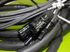 GreenVolts GV-SCP001 – close-up of MC4 solar cable T-branch connector with STOP/Do Not Disconnect warnings