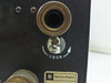Spectra-Physics 2210 — closeup of lock mechanism knob and upper water fitting on black face plate