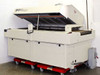 Vitronics ISO5006 solder reflow oven — right-side three-quarter view with hood open, mounted on red casters