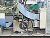 Interior lower section – internal switching power supply with IEC inlet, fan, additional PCBs, and wiring to drive bay area