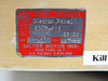 Close-up of Sector Motor Industries red identification plate reading: IDENT #53263, Matrix Panel, MFG P/N SMP-508, CUST NO 33/85, SER 011, VOLT 117VAC, Deer Park NY, U.S. Patent 3,970,980