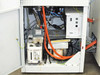 Interior of BOC Edwards Auto 500 smaller cabinet with access panel open — showing Edwards RV12 rotary vane pump, wiring harness, and orange high-voltage cabling