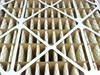 Macro close-up of Purolator Aero-Cell deep-pocket pleated filter media showing individual media pockets and wire mesh support