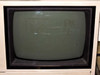 Seiko SFT7000 CRT monitor screen — powered off, showing surface wear and light scratches