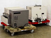 Seiko SFT7000 and SFT7300 — rear three-quarter view showing backs of both units on dollies
