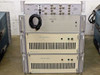 Rack stack showing SM-5 Signal Switcher (top, p/n 015-0281-00), Station Control Interface Unit (middle), and two 7 Phase Clock Generator units (bottom) — Tektronix branding visible