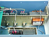 Uniforce PSIF-2 internal view showing OUTPUT 1, OUTPUT 2, OUTPUT 3 power rails, Deltron W100 transformer, and capacitor bank