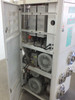 High Point dryer loader — right cabinet panel open showing upper heater modules, mid-section desiccant/blower assembly, and two regenerative blower units at bottom