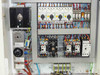 Lanco LTX08 upper electrical sub-panel — VFD or soft-starter unit at left, Moeller Q2 and Q4 motor starters, KSM contactors, and black multi-pole main switch
