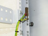 Nimbus NSD360-3 interior side rail detail showing internal grounding bus bar with green-yellow and red bonding cables