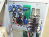 Interior view of chiller cabinet showing Kubota STP-2 printed circuit board, wiring harness, and solid state relay components