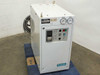 Kubota STP-330-145 recirculating chiller temperature controller front view showing control panel, dual pressure gauges, and Kubota branding