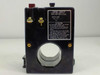 Fuji Electric BRR21N-01S Earth Leakage Relay – left-side view showing contact capacity label, attention instructions, through-hole aperture, and DIN rail base