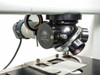 Carl Zeiss H-Pi nosepiece and condenser body close-up — Made in West Germany label visible, illuminator fiber/light guide attached at left