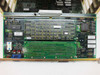 Fuji Electric VT2-HMCPU Main CPU card – full PCB top view showing large memory IC array, sub-board mounted on main board, EPROM ICs, and bus edge connector