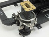 Varian VUJ-8527-01 – close-up of circular waveguide port end with brass rectangular waveguide flange, stainless steel clamp band, and rotary/pivot joint