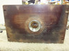 Meiki MDMI mold tool opposite platen face showing textured dark steel surface, central sprue gate, and corner bores