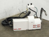 Base mount and positioning — arm attachment point and work surface interface
