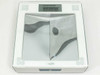 Insight 1380 scale top view with mirror panels visible and warning label reading slippery when wet, do not use on carpet
