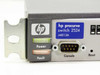 HP ProCurve Switch 2524 front-left close-up showing Power and Fault LEDs, DB-9 console port, and Reset button