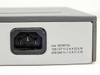 HP ProCurve 2524 rear panel showing IEC C14 power inlet with voltage rating 100-127V / 200-240V 50/60Hz