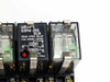Close-up of Omron G3FM-2R5 SLN solid state relay label showing 0.5A 250VAC 125VDC rating and Fuji HH52PW-L DC24V relay