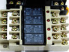 Omron G6B-1114P relays in PYFO8A sockets close-up showing labels: 24VDC coil, 5A 250VAC contact rating, Made in Japan