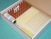 Optibreed 460117 sperm quality analyzer test kit open box showing rack of 50 amber capillaries in foam tray and clear pipette tip tray