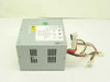 IBM 12J5991 API-6056 90W desktop power supply – front and right side view showing ventilation slots and output harness with 20-pin ATX, Molex, and floppy connectors