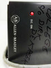 Allen-Bradley 1771-P2 front panel showing A-B logo, D.C. ON indicator LED, and marker writing on housing